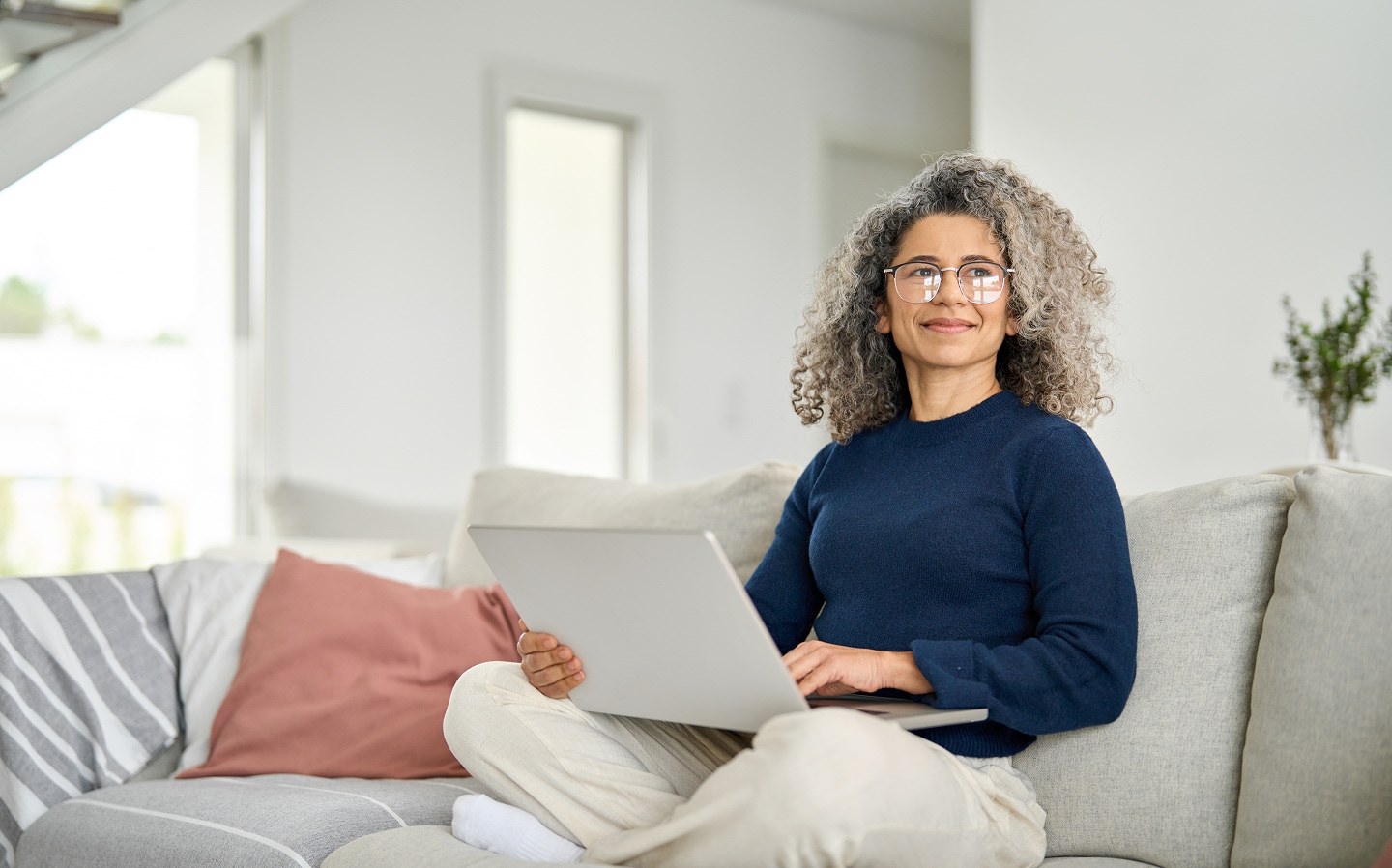 OmniWatch customer using her laptop